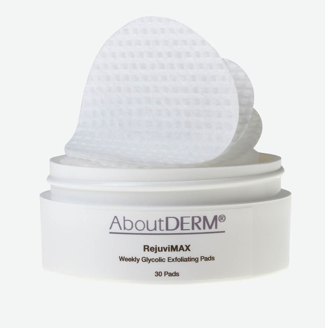 A white container of facial pads with a heart shaped pad.